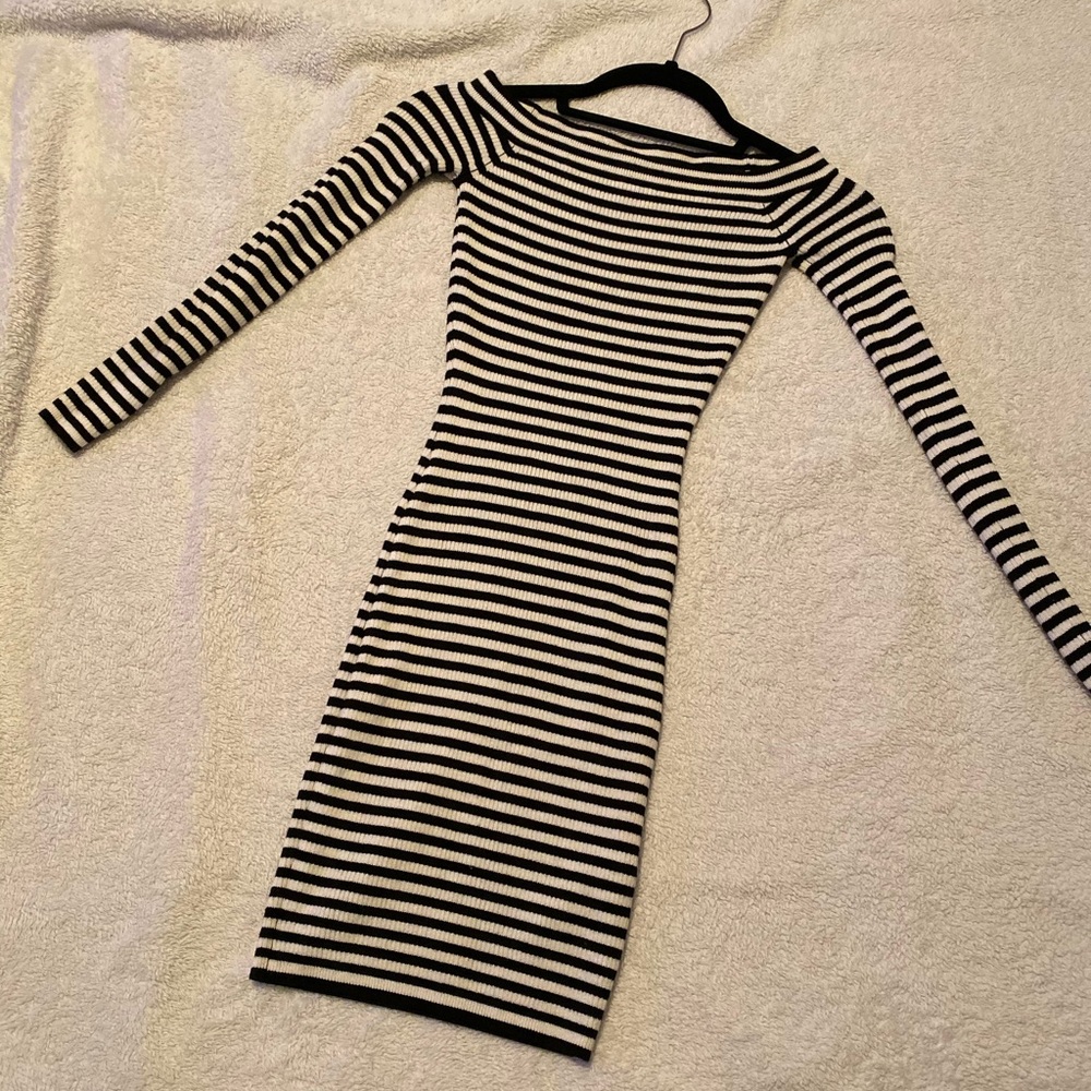 Form fitting off the shoulders mini dress